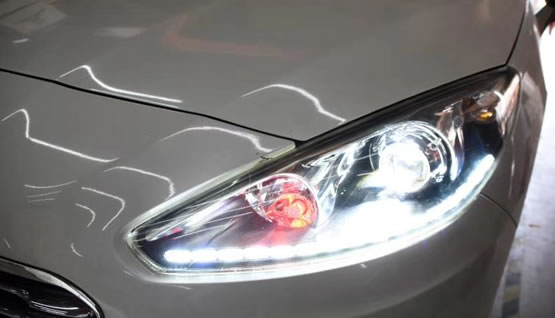 西安改装标致308汽车大灯 升级LED透镜及流光日行灯